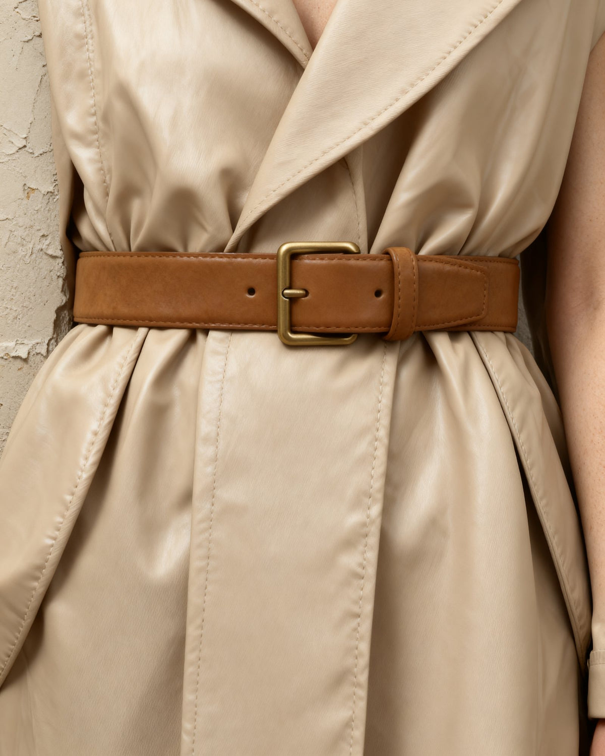 the anchor: the camel suede belt cinching an oversized coat at the waist