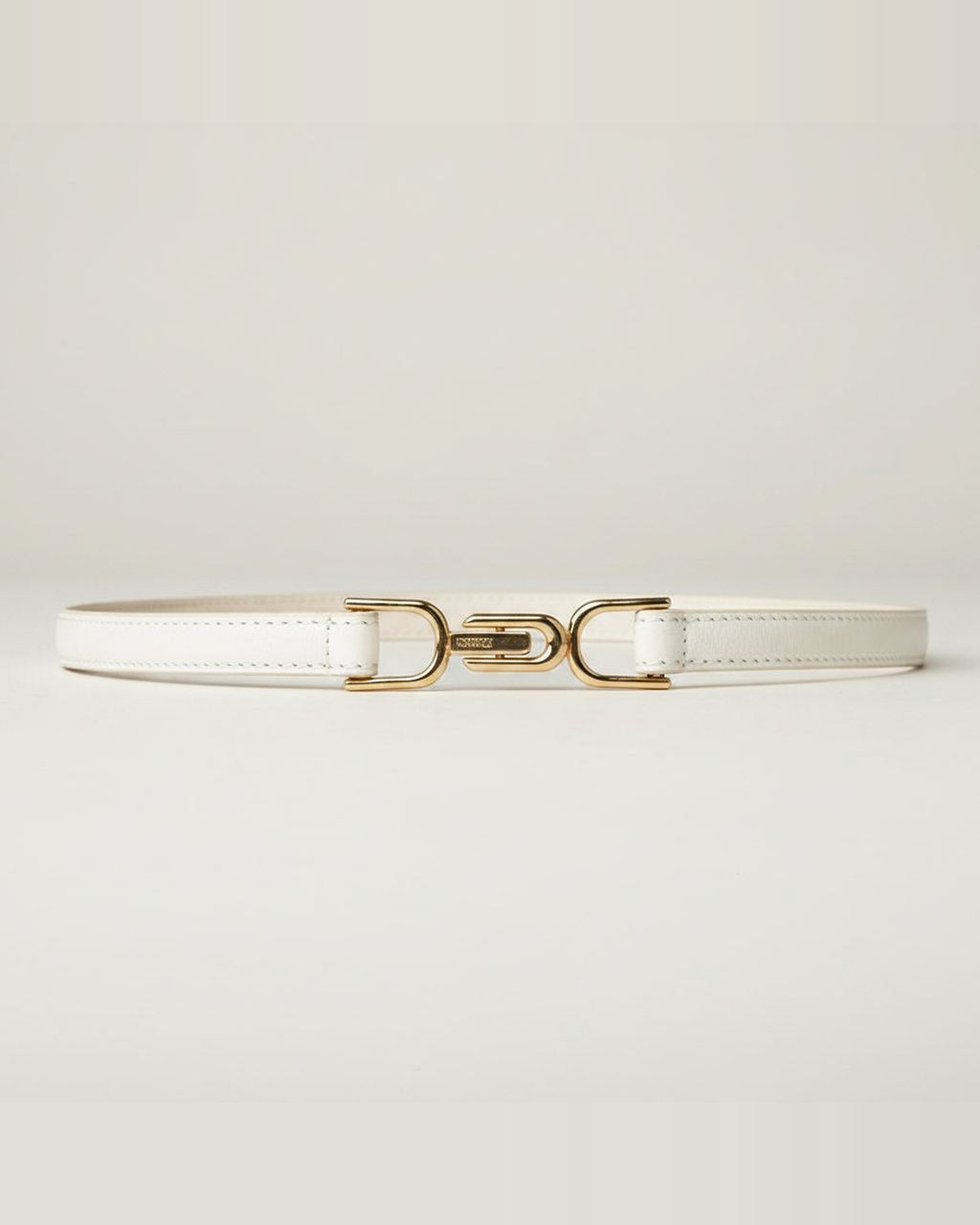 the hook: ivory belt, coiled