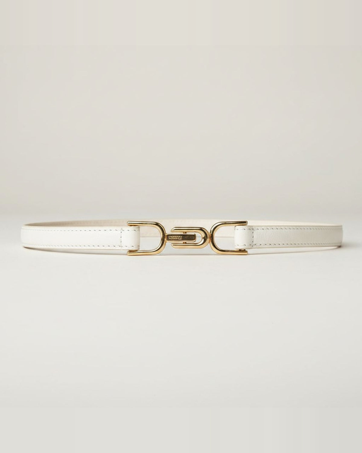 the hook: ivory belt, coiled