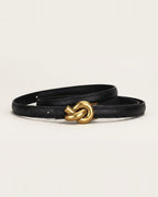 the line — black belt, coiled