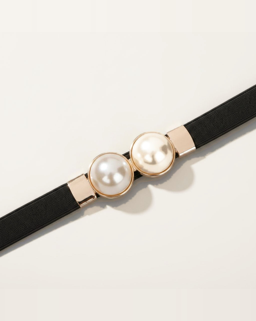 the pearl: black belt, coiled