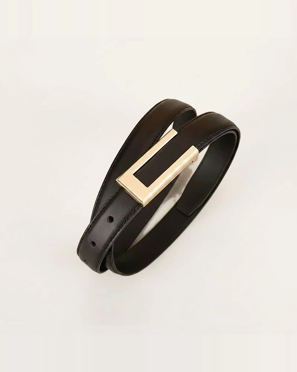 the rule: rectangular gold buckle and slim strap