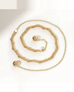 the tail — gold waist chain